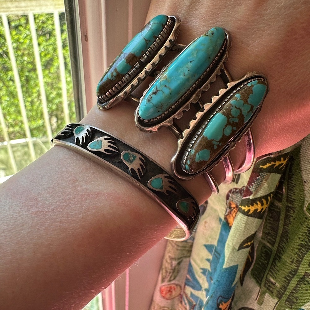 Artist signed Tufa cast Sterling turquoise bear paw cuff